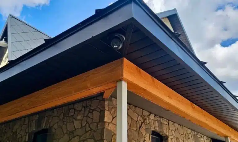 Uniview dome camera under the eave of a home, installed by JR Security Solutions in Wellington County, Ontario